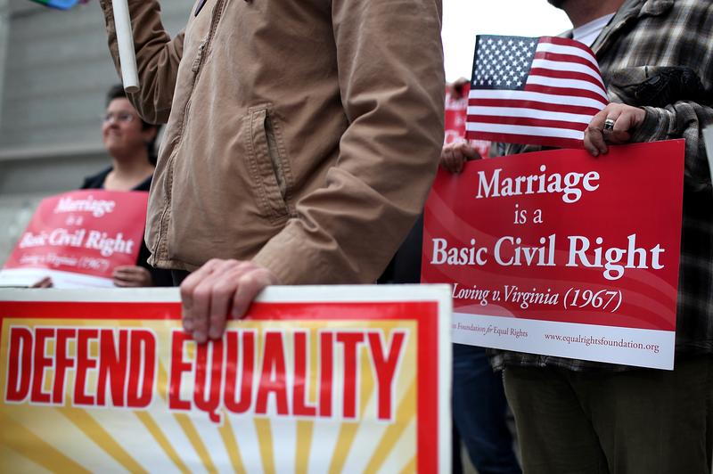 Opponents of Proposition 8, California's anti-gay marriage bill, hold signs outside of the Ninth U.S. Circuit Court of Appeals on February 7, 2012 in San Francisco, California.